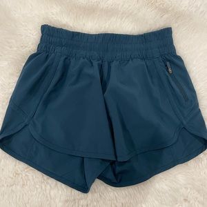selling size 6 lululemon tracker shorts. never worn because they are too big.